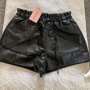 Misguided leather shorts — flowy